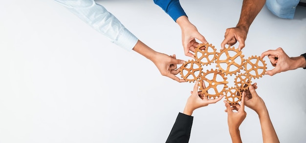 Foto la bandiera panoramica superiore della squadra aziendale che si unisce alla ruota dentata in circolare simboleggia insieme un gruppo di successo di partnership aziendali e lavoro di squadra collettivo sul posto di lavoro con efficienza produttiva prudente