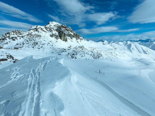 The top station and ski slopes. Morning winter mountain landscape, Austria. All people are unrecognizable