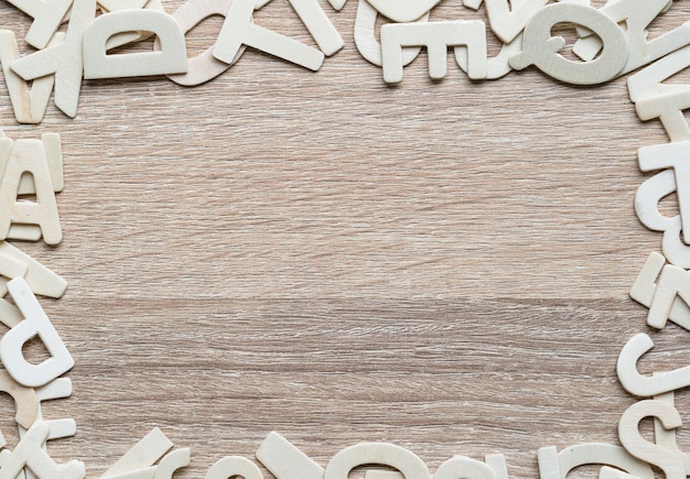 Top view ABC alphabet on wood background