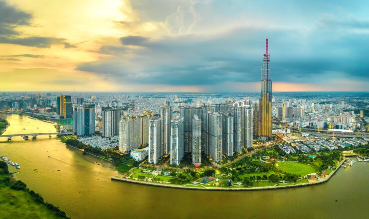 Photo top view aerial of center ho chi minh city, vietnam, beauty skyscrapers along river urban developmen