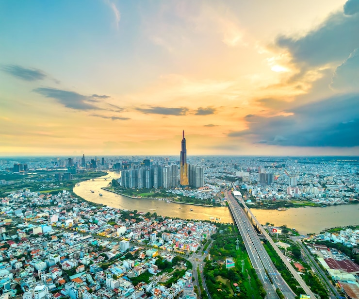 Photo top view aerial of center ho chi minh city, vietnam, beauty skyscrapers along river urban developmen