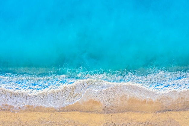 Top view aerial drone photo of Myrtos beach with beautiful turquoise water and sea waves Vacation travel background Ionian sea Kefalonia Island Greece