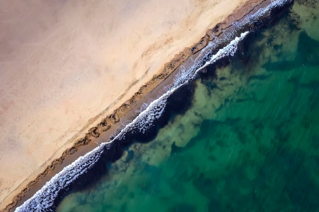 Top view aerial photo from flying drone of beautiful sea landscape with turquoise water with copy space for your advertising text message or promotional content website background