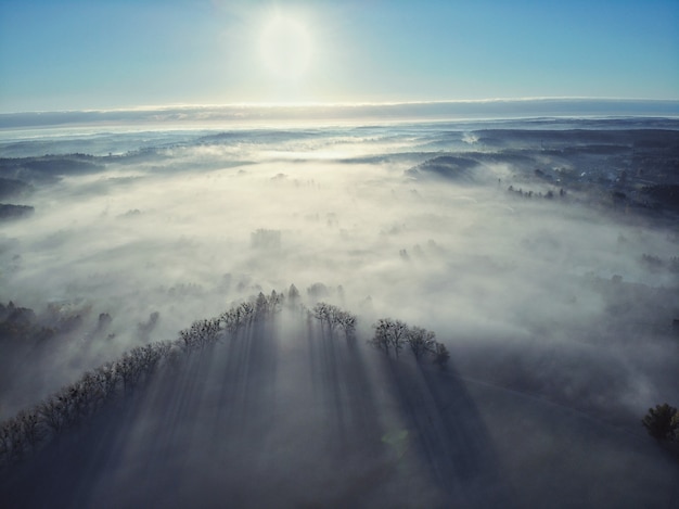 Top view aerial shot of foggy Polish village