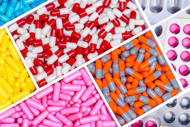 Top view of antibiotic capsules and tablet pills Antibiotic drug resistance Superbug Full frame