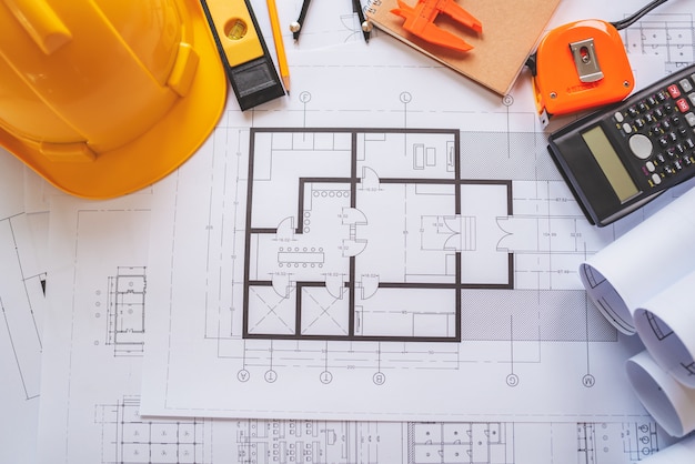 Top view of architectural blueprints on the worktable.