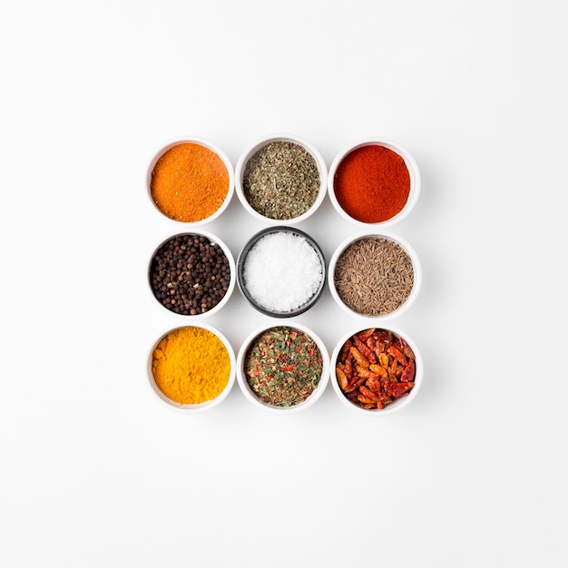 Photo top view arrangement with spices in bowls