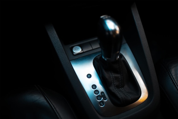 Top view of automatic gearbox selector Dark photo Closeup