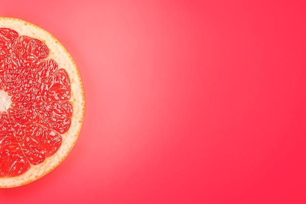 Top view background of sliced fresh grapefruit