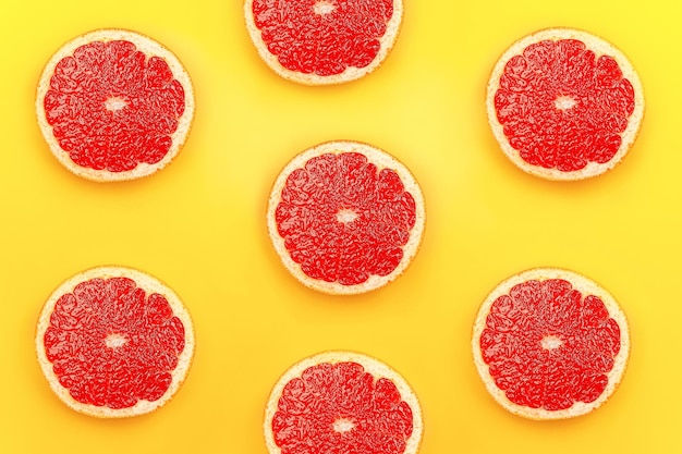 Top view background of sliced fresh grapefruit