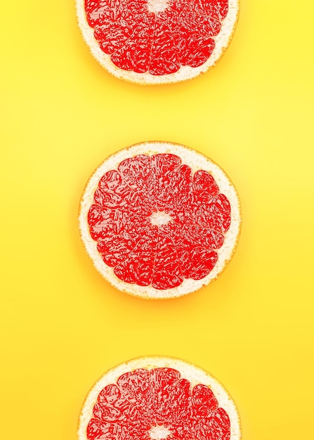 Top view background of sliced fresh grapefruit