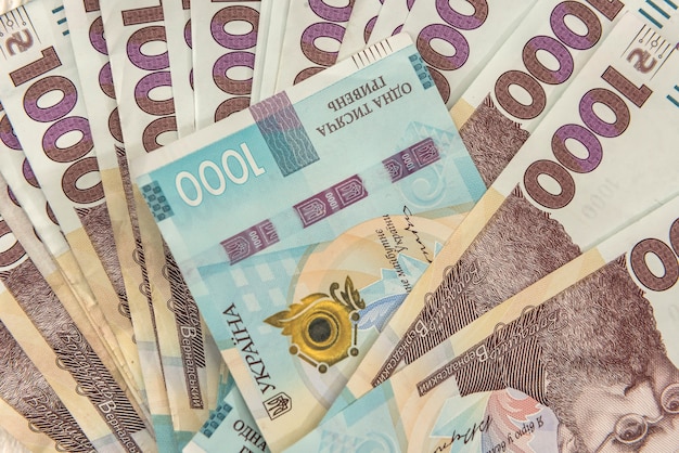 Фон вид сверху с новой банкнотой Украины 1000, грн. Финансовый фон