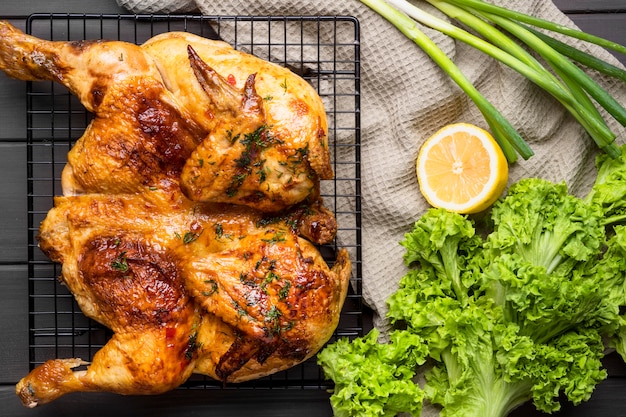 Photo top view baked whole chicken