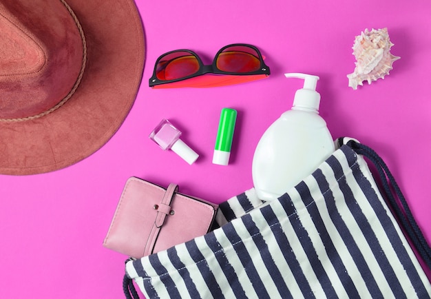 Top view of beach bag and accessories