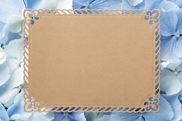 Top view of beautiful flowers with blank card