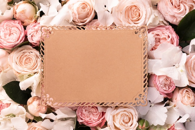 Top view of beautiful flowers with blank card