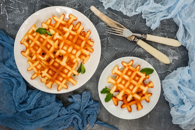 Top view of Belgian waffles on table.