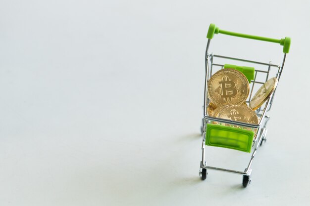 top view of bit coin on shopping cart
