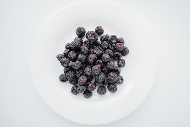 top view black raspberry berries on the plate