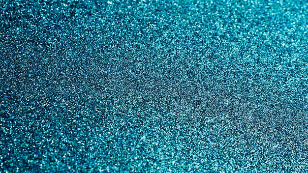 Photo top view blue glitter background