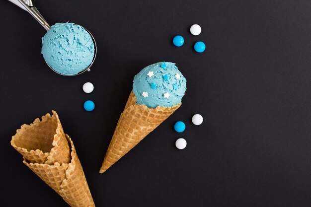 Top view of blue ice cream in a waffle cone