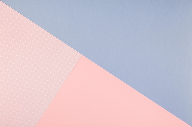 Top view of blue and pink papers