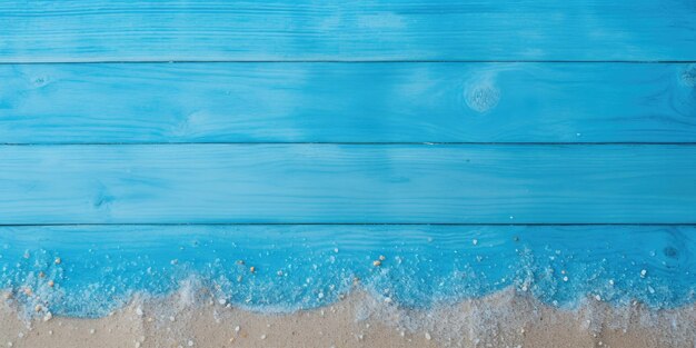 Foto vista superiore del pavimento di legno blu con spazio di copia coperto di sabbia marina