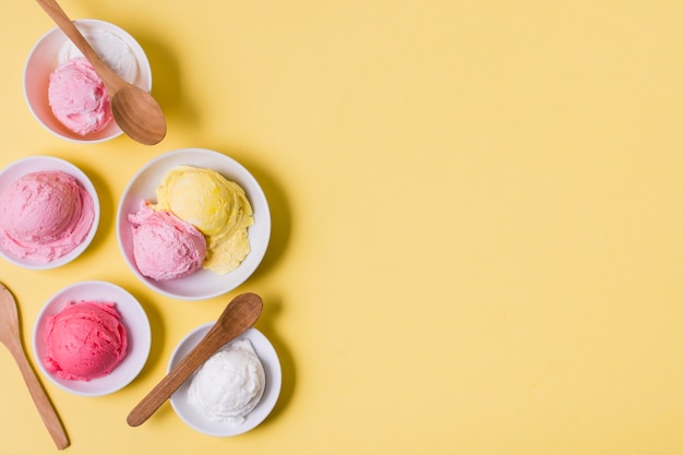 Top view bowls with ice cream with copy-space