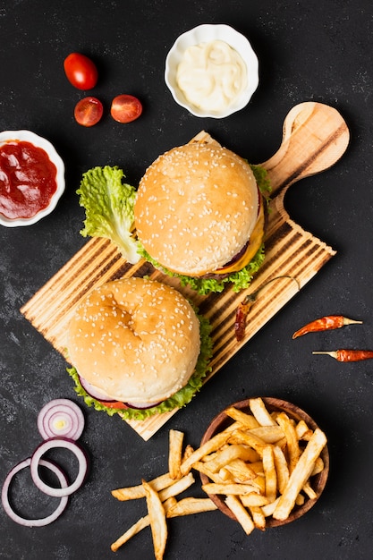 Top view of burgers with french fries