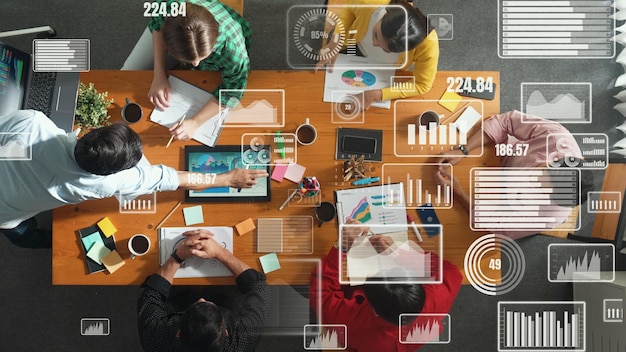 Top view of business people working and analyzing investment data convocation