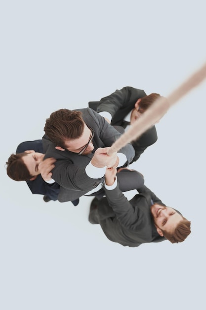 Top view business team helps the boss to climb up