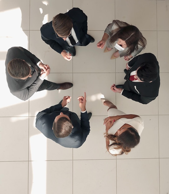 Top view the business team is brainstorming the concept of teamwork