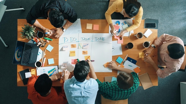 top view of business team making scrum task board at meeting room convocation