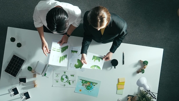 Top view of businessman and manager talking about clean energy alimentation