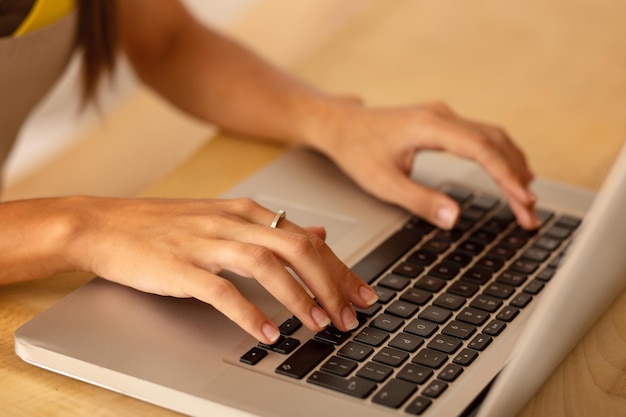 Top view of businesswoman typing message for investor