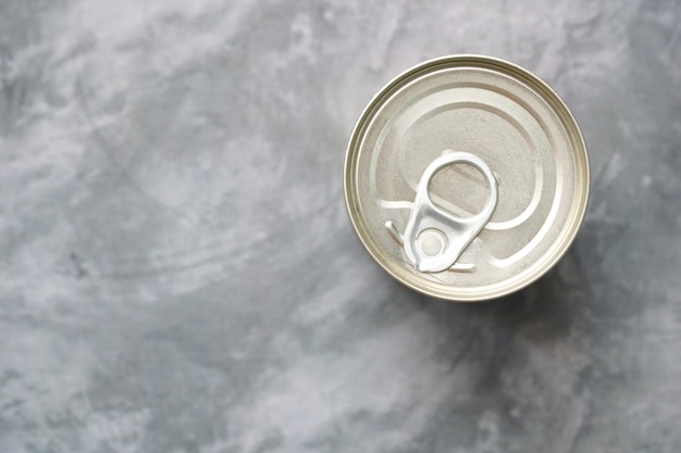 top view of a can on a grey