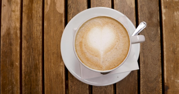 Top view of cappuccino cup with latte art