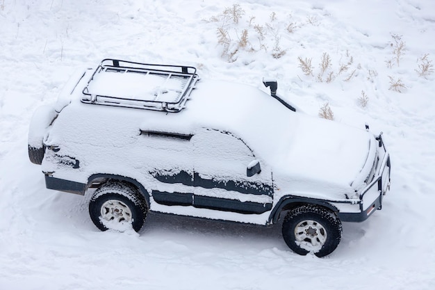 Top view of a car covered in snow