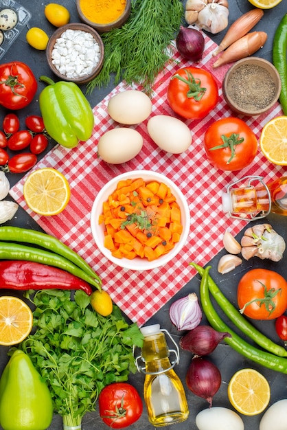 top view carrot salad with fresh vegetables and greens on a dark background lunch food health dough meal color diet snack salad