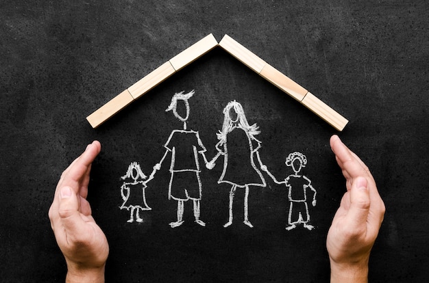 Top view chalk drawing of parents with their children