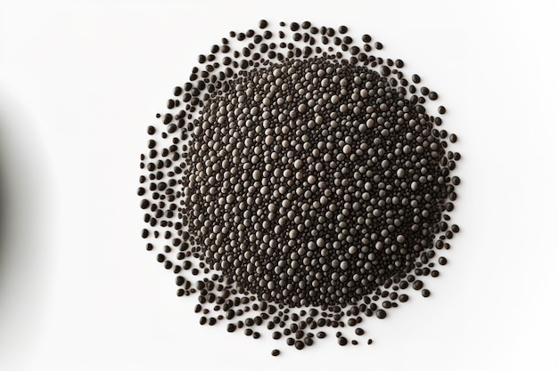 Top view of chia seeds strewn across a white background