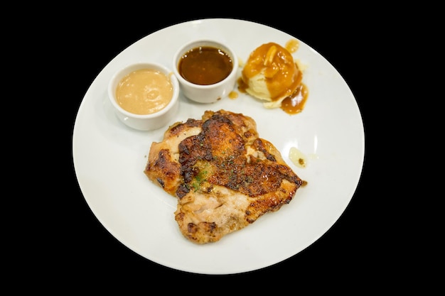 Top view of Chicken Steak with Black Pepper on a white plate focus selective