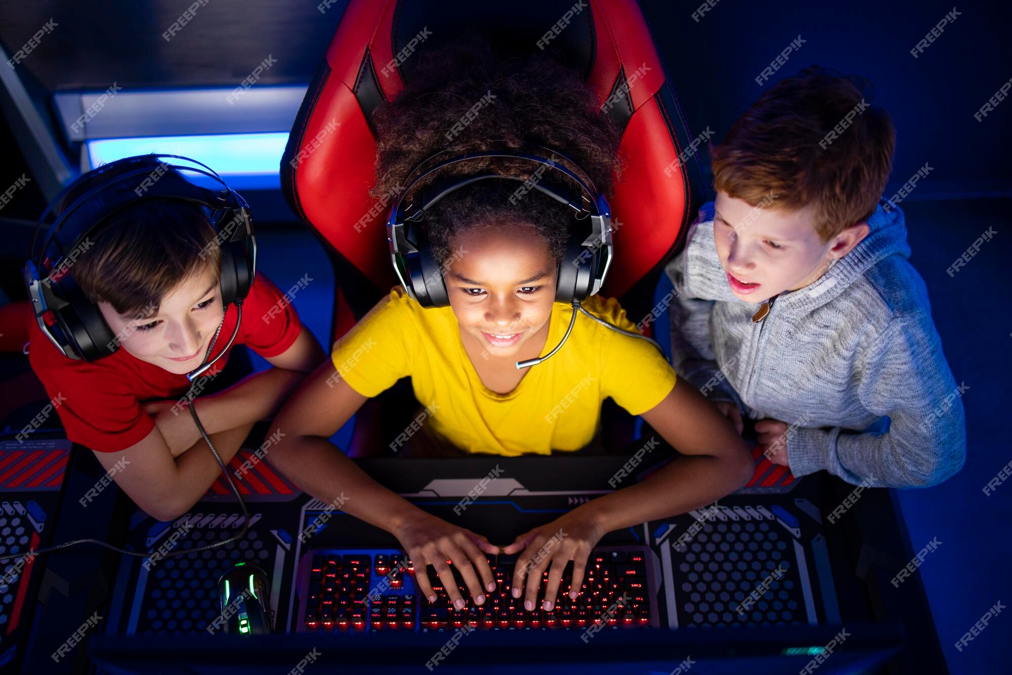 Premium Photo  Child playing computer games