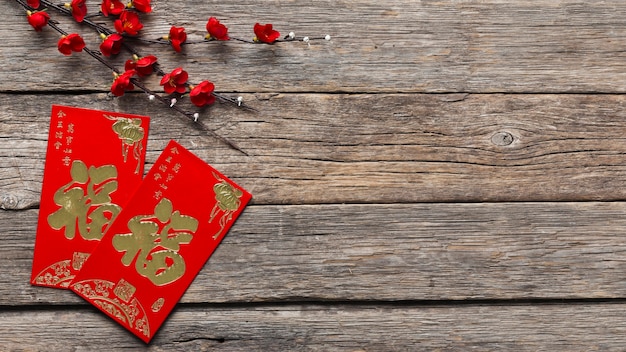 Top view of chinese new year concept on wooden table