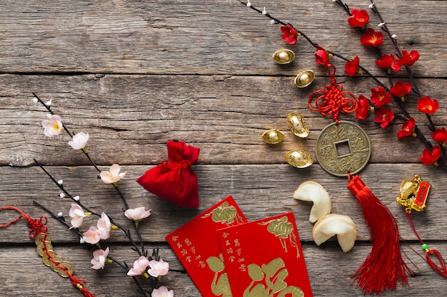 Top view of chinese new year concept on wooden table