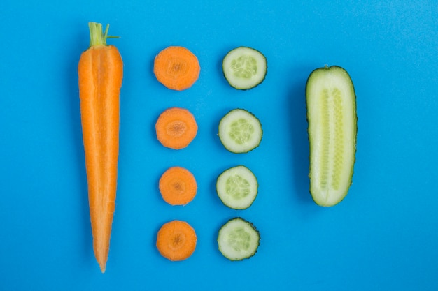 Top view of chopped carrot and cucumber