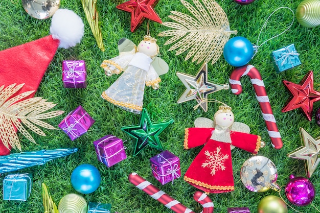 Top view Christmas decoration on green grass 