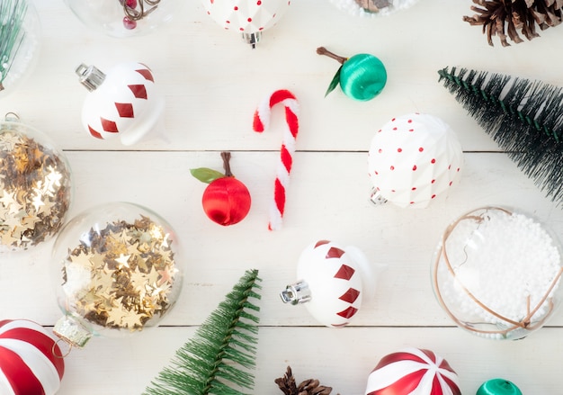 top view of Christmas decoration with pine cones, tree toy and balls