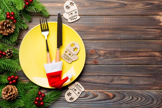 Top view of Christmas dinner on wooden surface