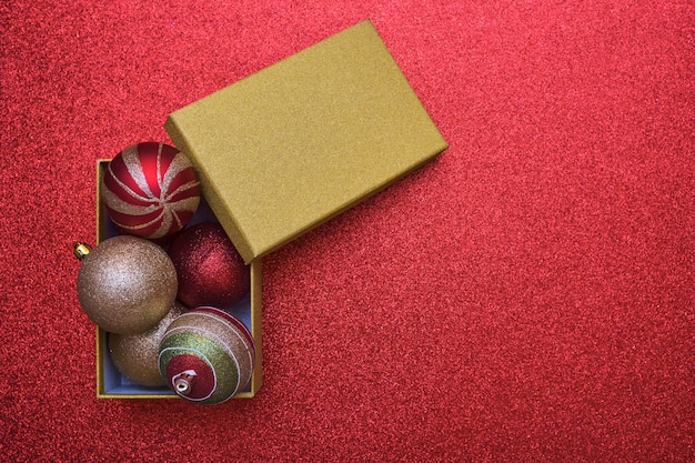 Top View of Christmas Gift Box with Christmas balls inside with copy space.